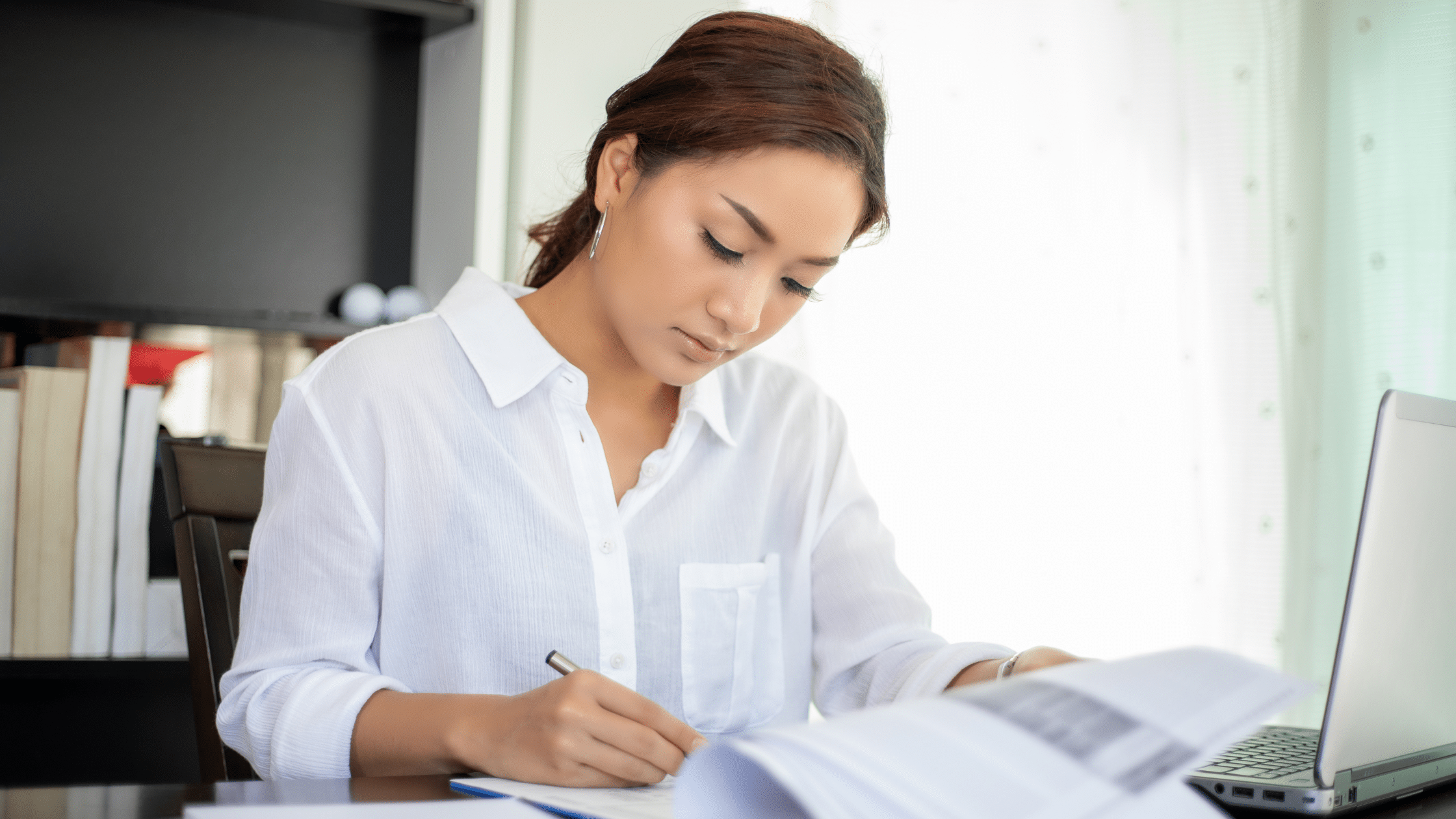 Immigration paralegal reviewing AI in immigration software